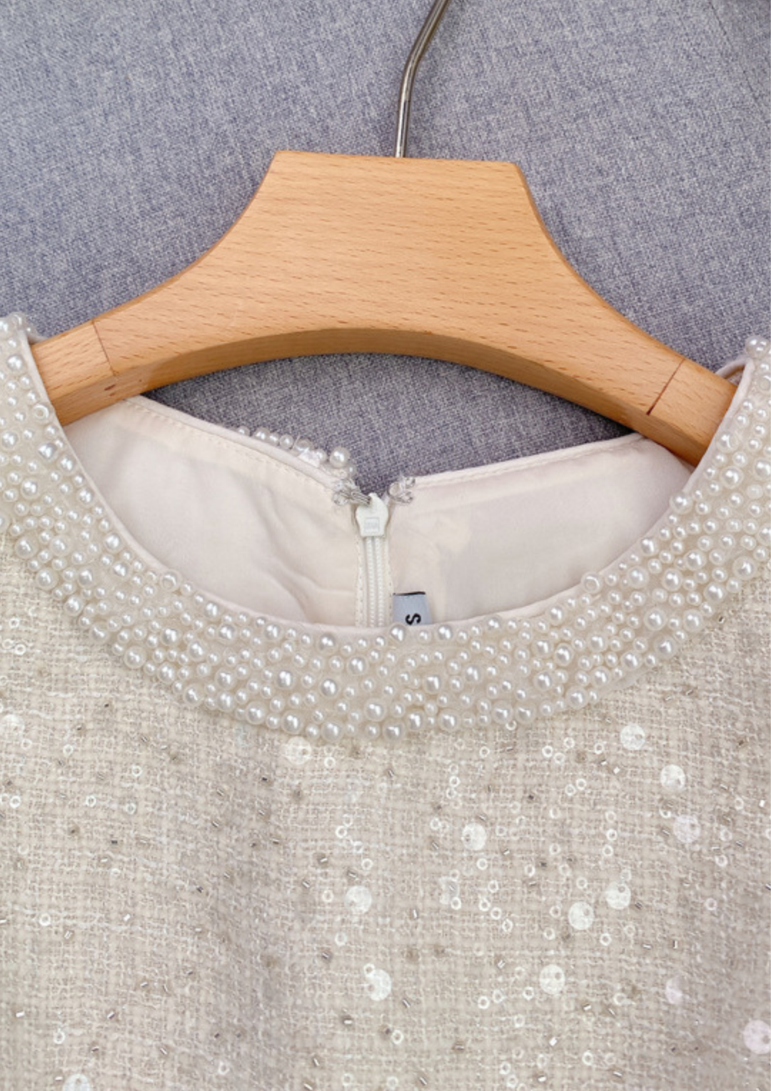 Serene Shine Pearl Sequin Bow Open Waist Mini Dress