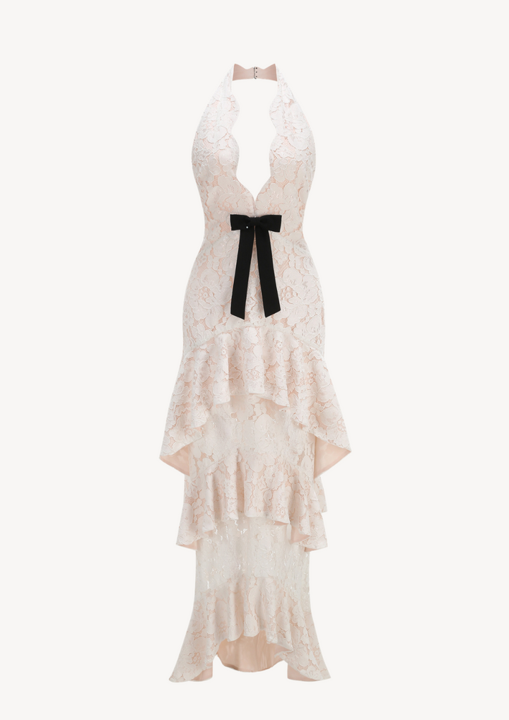 lily Evelina floral lace maxi dress with a plunging halter neckline, cascading ruffles, and a black bow detail.