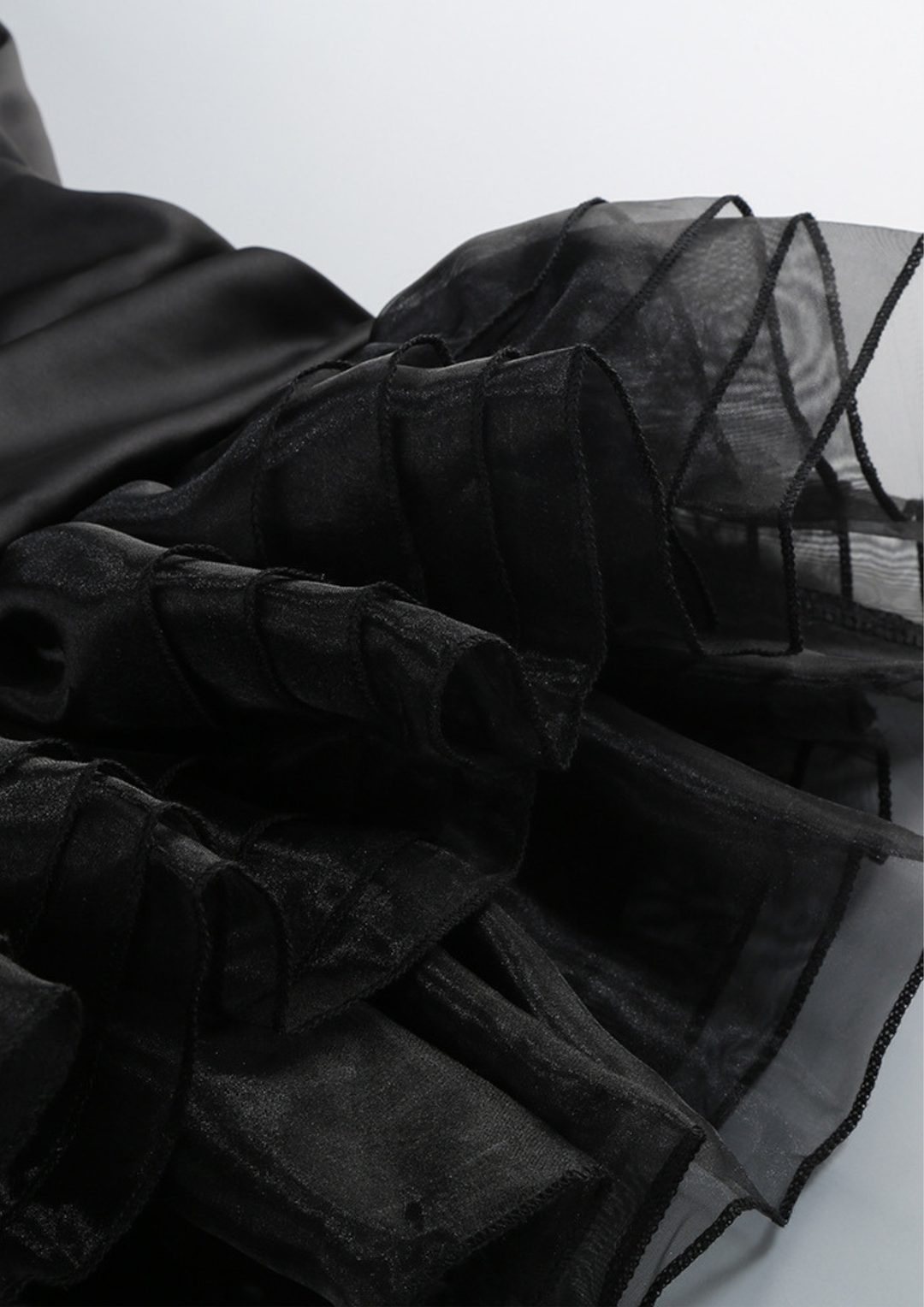 Noir Whisper Backless Ruffle Mini Dress